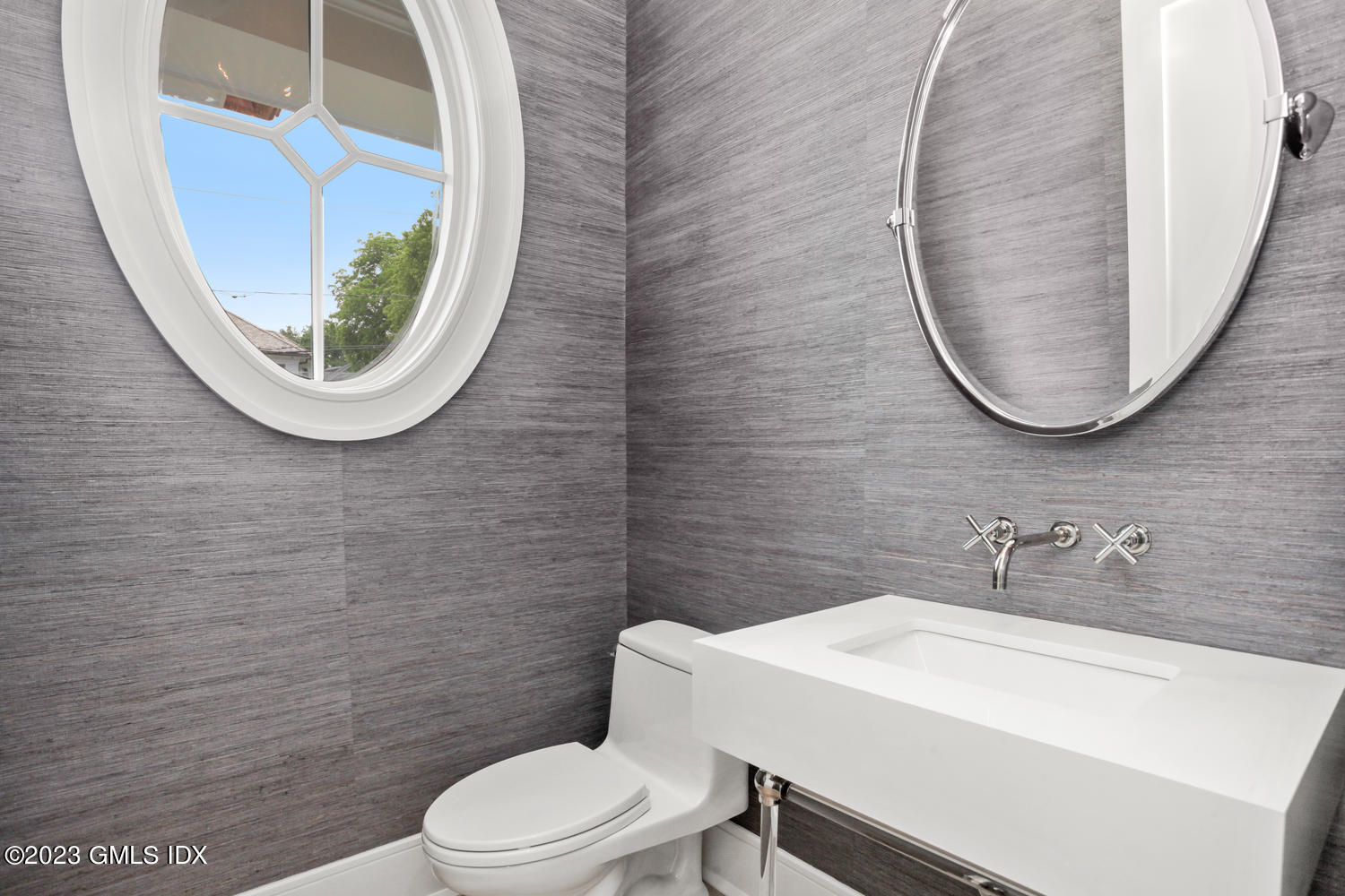 4 Ford Lane Old Greenwich, CT 06870 - Photo 7 of 43 a bathroom with a toilet and a sink