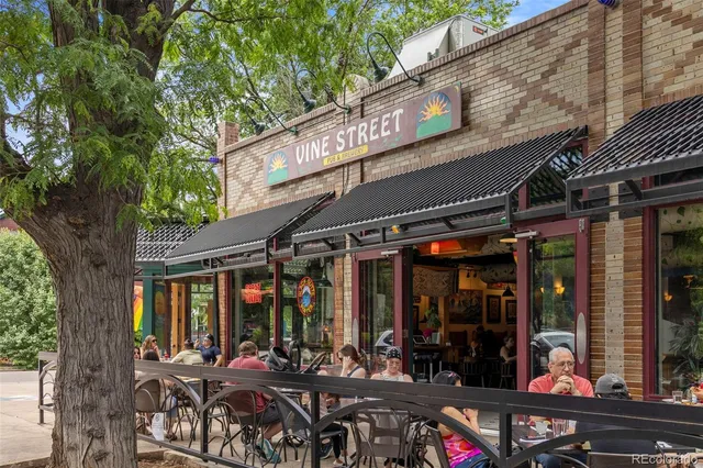 a view of a chairs and tables in patio