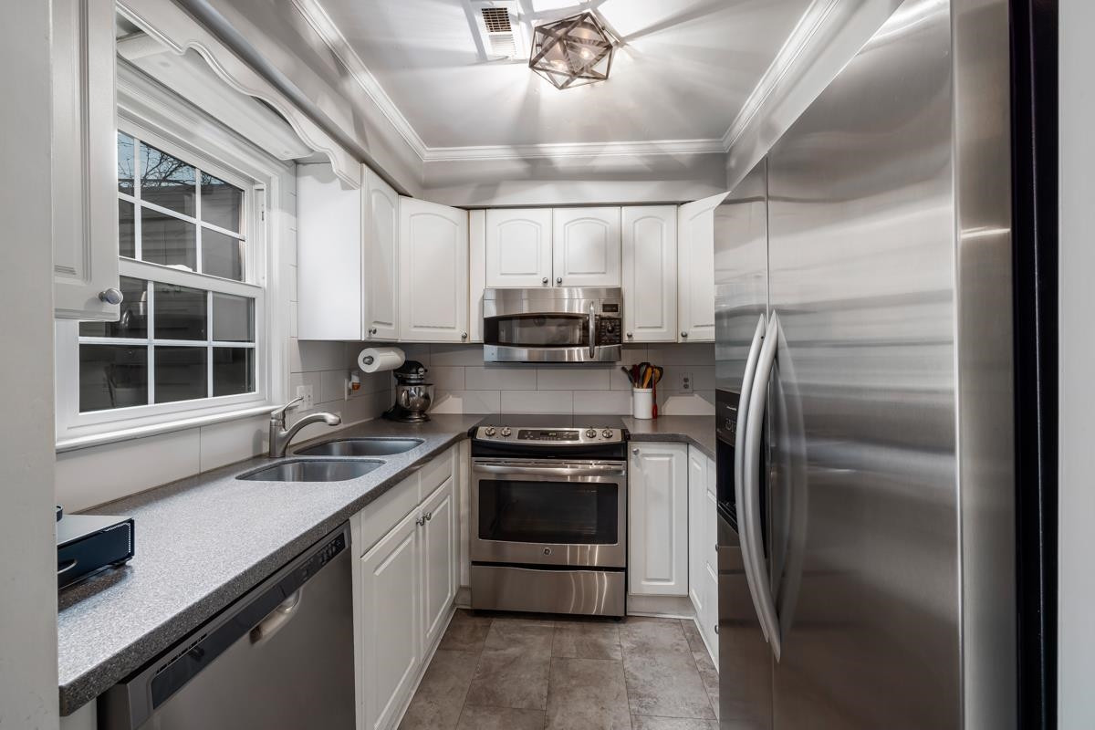 1336 Dylan Heath Court Raleigh, NC 27608 - Photo 13 of 25 Photo 13