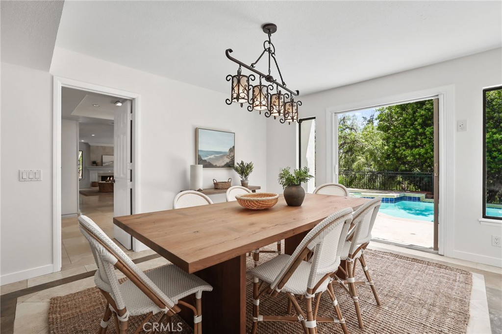 1862 Derby Drive North Tustin, CA 92705 - Photo 13 of 52 a view of a dining room with furniture window and wooden floor