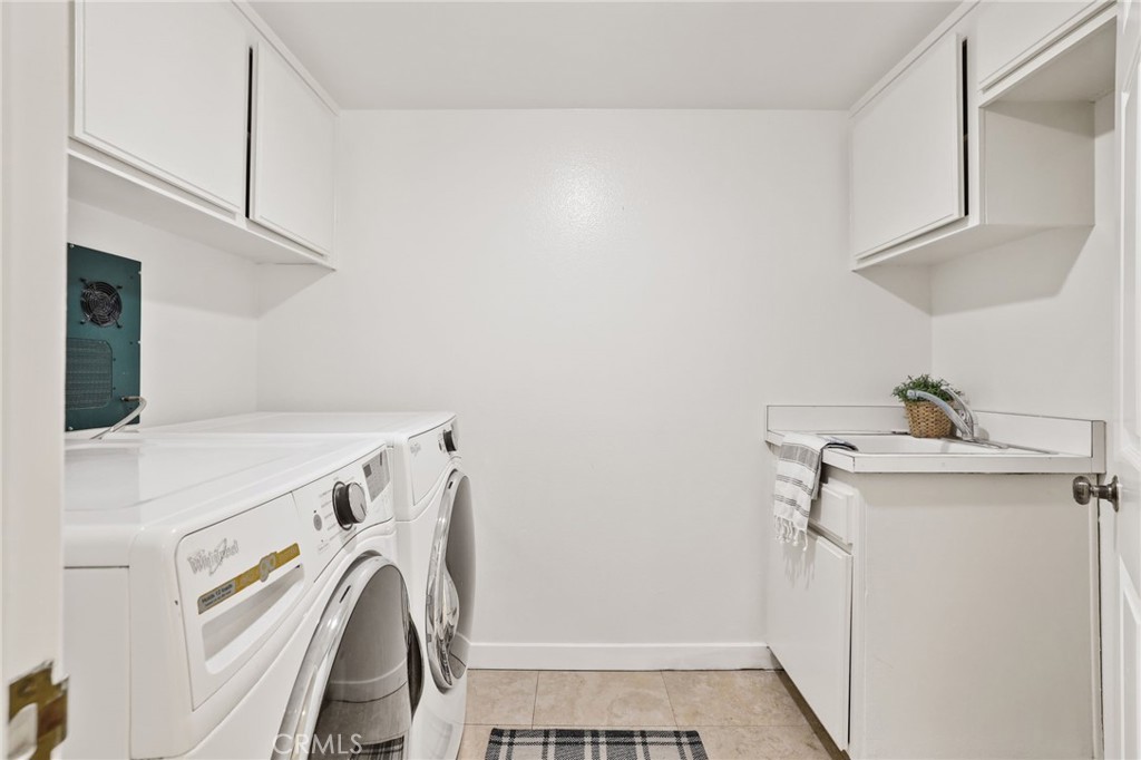 1862 Derby Drive North Tustin, CA 92705 - Photo 15 of 52 a view of storage and utility room with washer and dryer