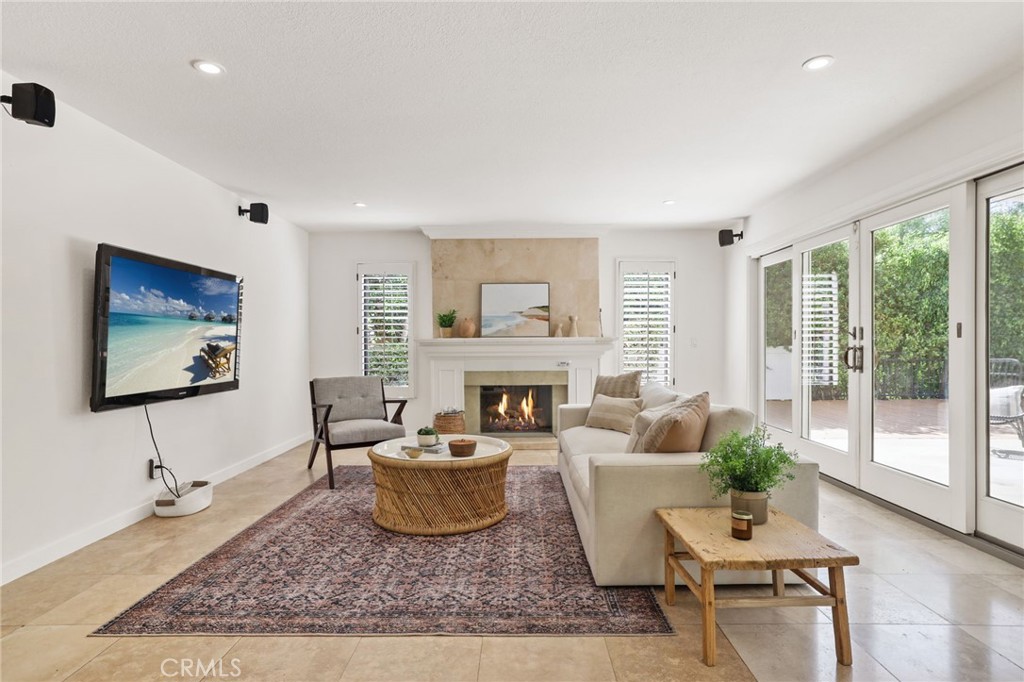 1862 Derby Drive North Tustin, CA 92705 - Photo 23 of 52 a living room with furniture couches and a flat screen tv