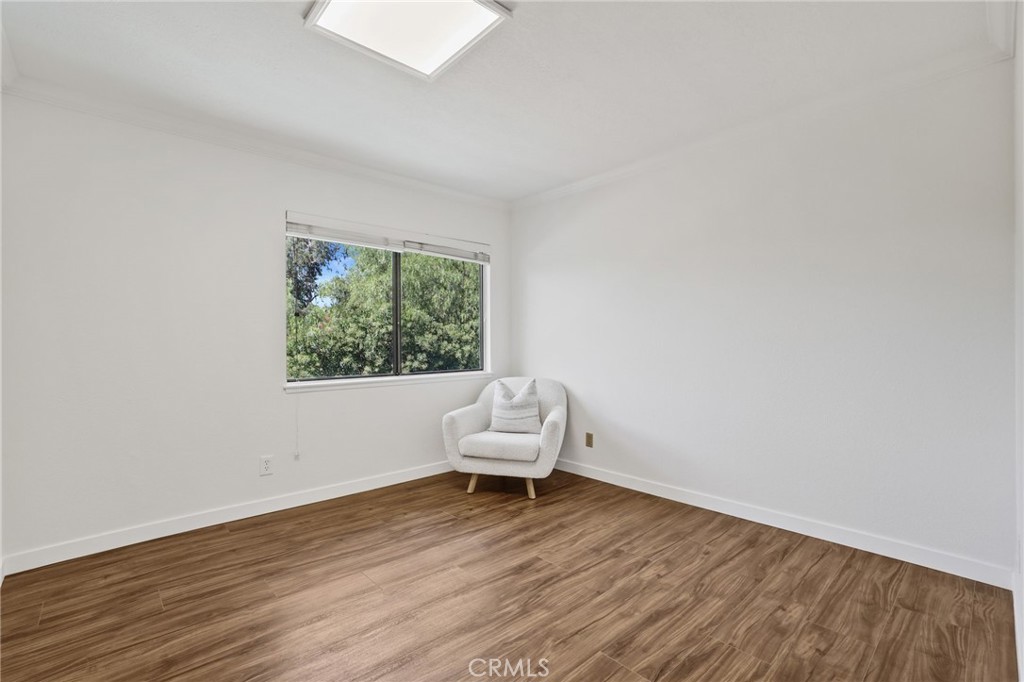 1862 Derby Drive North Tustin, CA 92705 - Photo 36 of 52 a living room with a wooden floor and a window