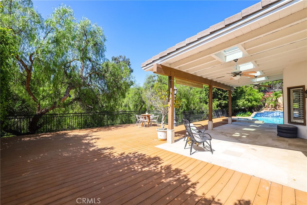 1862 Derby Drive North Tustin, CA 92705 - Photo 48 of 52 a patio with a table and chairs and potted plants