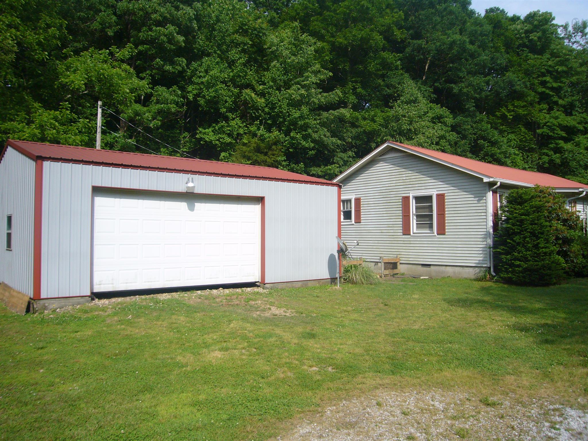 1005 North Springs Road Red Boiling Springs, TN 37150 - Photo 12 of 20 a view of front of a house with a yard