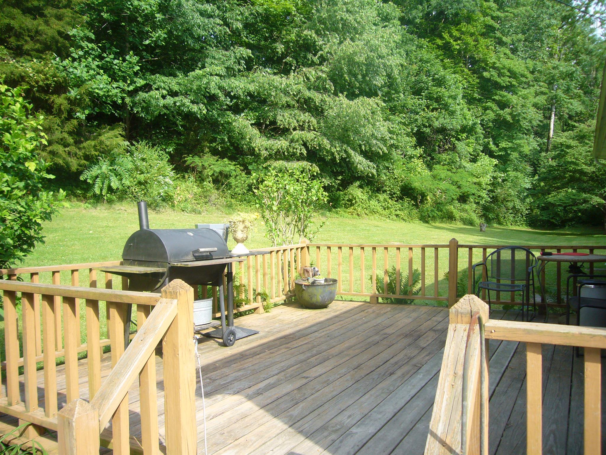 1005 North Springs Road Red Boiling Springs, TN 37150 - Photo 16 of 20 a balcony with wooden floor