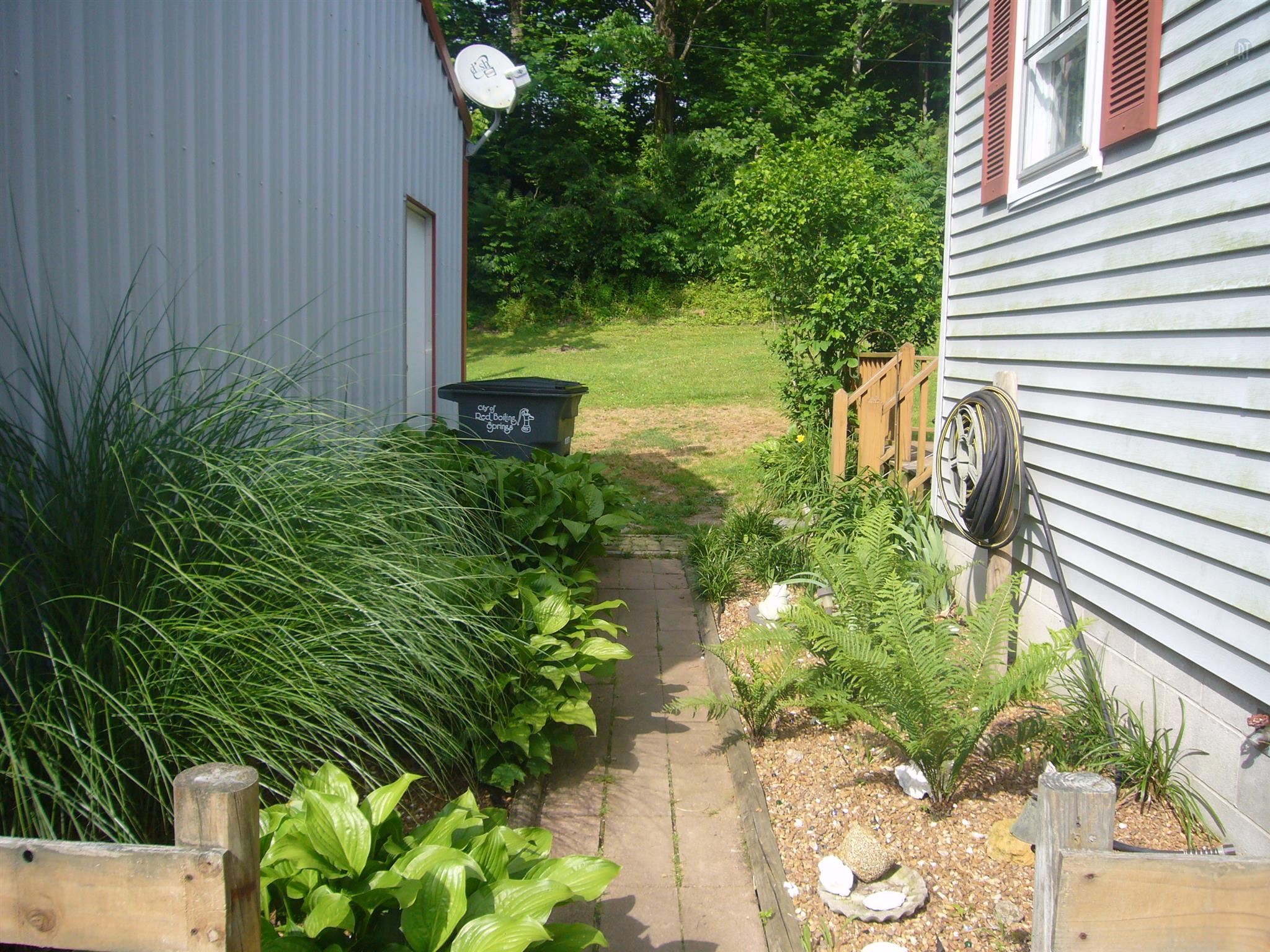 1005 North Springs Road Red Boiling Springs, TN 37150 - Photo 20 of 20 a view of a yard with plants