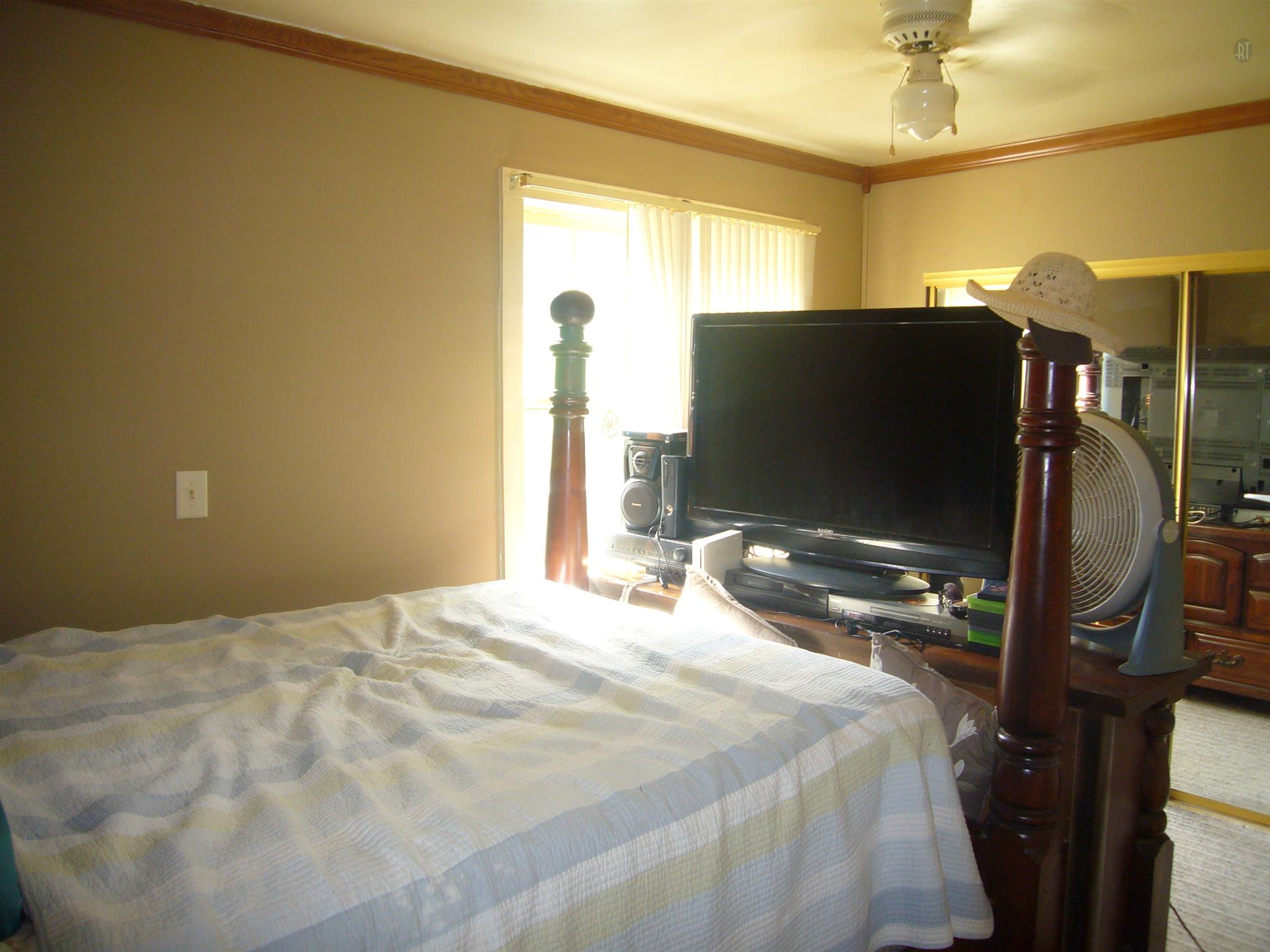 1005 North Springs Road Red Boiling Springs, TN 37150 - Photo 10 of 20 a bedroom with a bed window and flat screen tv