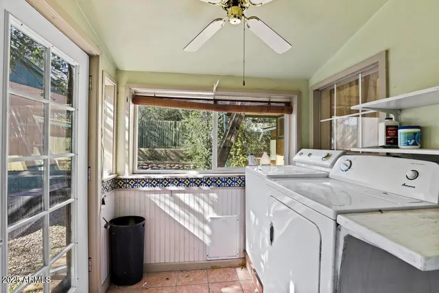 a kitchen with a stove a sink and a refrigerator
