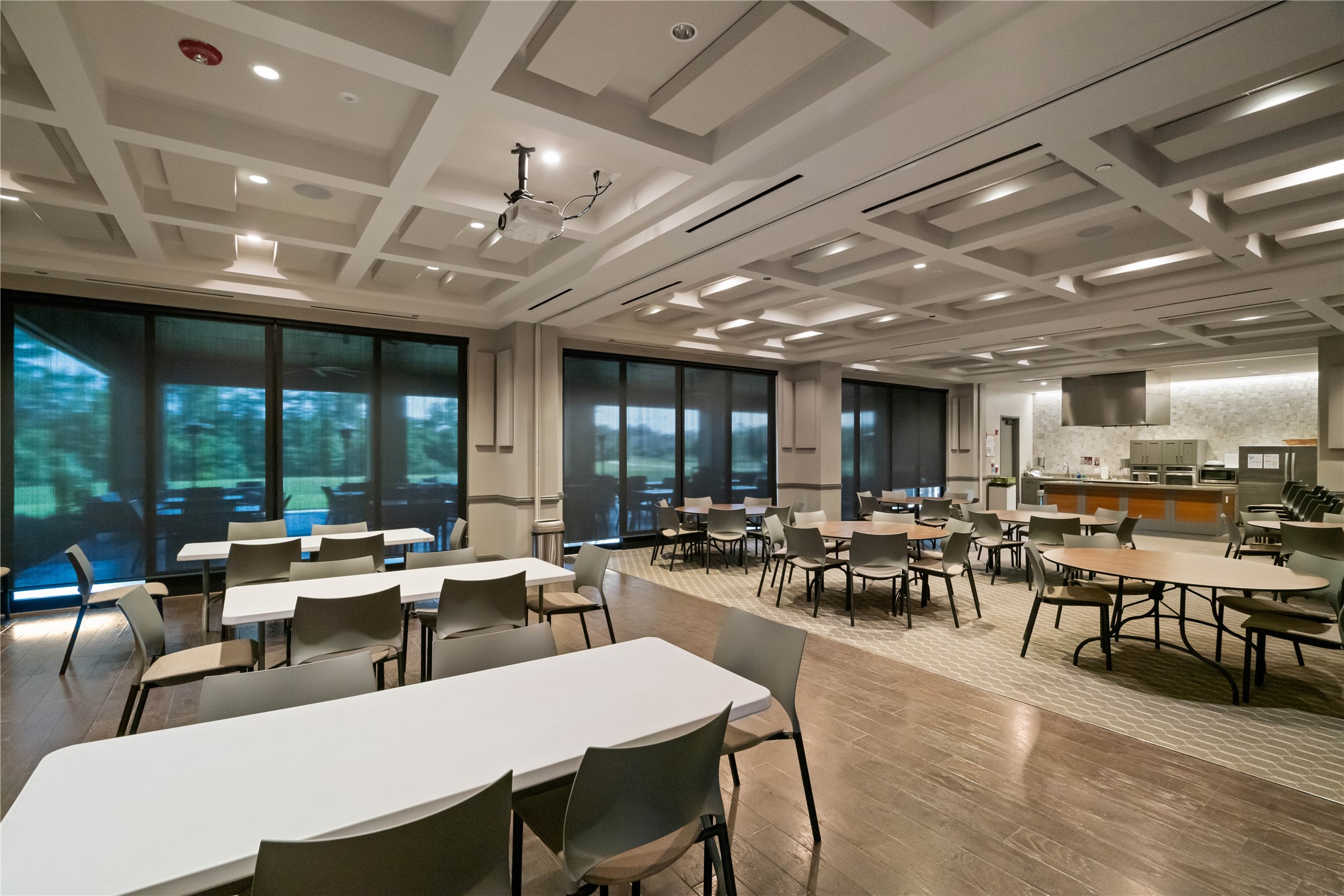 516 Nokota Drive Spring, TX 77382 - Photo 28 of 33 Recreational and dining room which is the heart of so many social events. Commercial grade kitchen sits at the back of the room with doors opening to the oversized outdoor space and fire place.