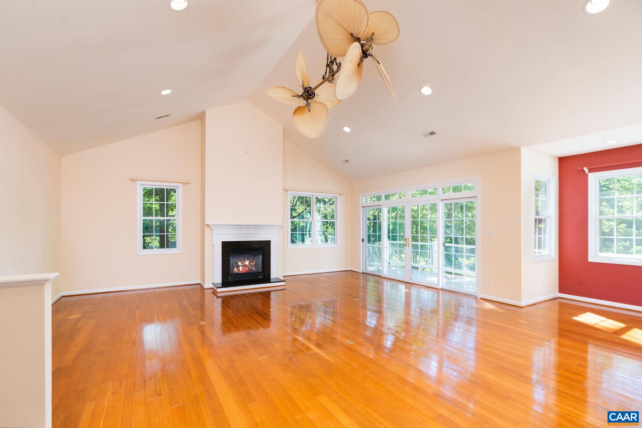 21 Amethyst Road Palmyra, VA 22963 - Photo 4 of 66 a view of a livingroom with a fireplace window and wooden floor