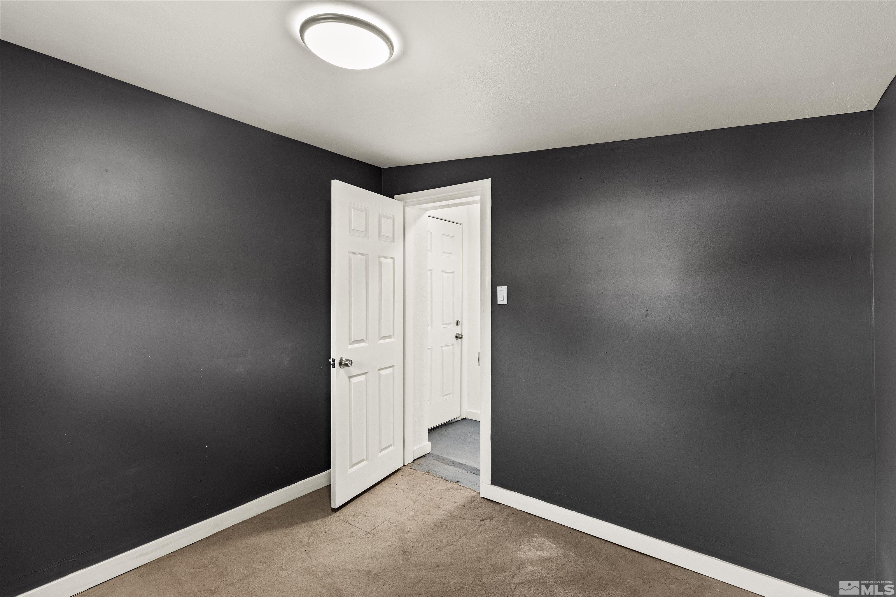 464 Cedar Street Reno, NV 89512 - Photo 24 of 40 an empty room with a door