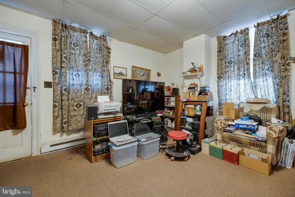 a room with furniture and a window