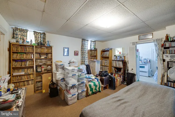 a kitchen with a refrigerator and window