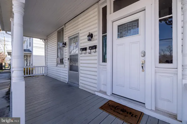 a view of a balcony with car parked