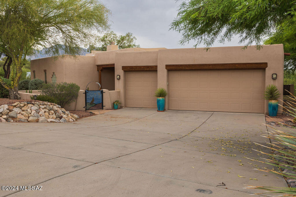 771 West Sedona Ridge Place Oro Valley, AZ 85755 - Photo 1 of 22 a house view with a outdoor space