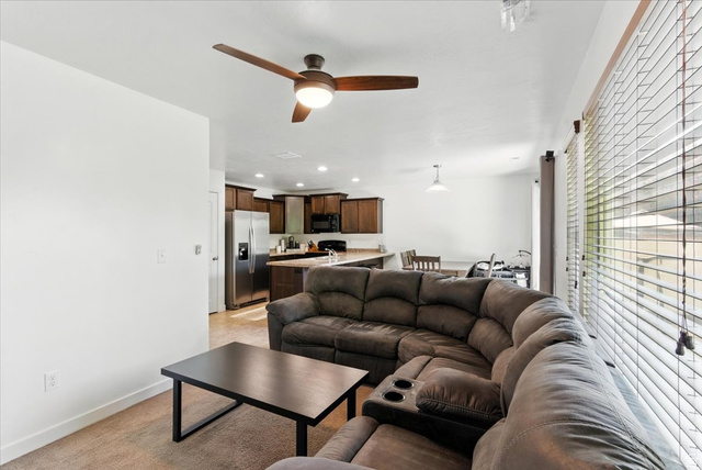 1187 Seraphim Court Layton, UT 84041 - Photo 3 of 18 Living area featuring a ceiling fan and recessed lighting