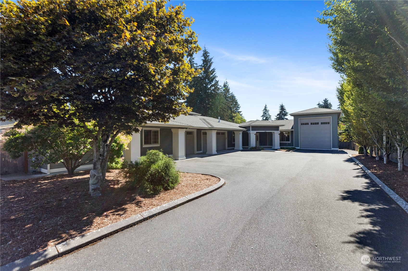 120 216th Street Southwest Bothell, WA 98021 - Photo 2 of 40 a front view of a house with a yard