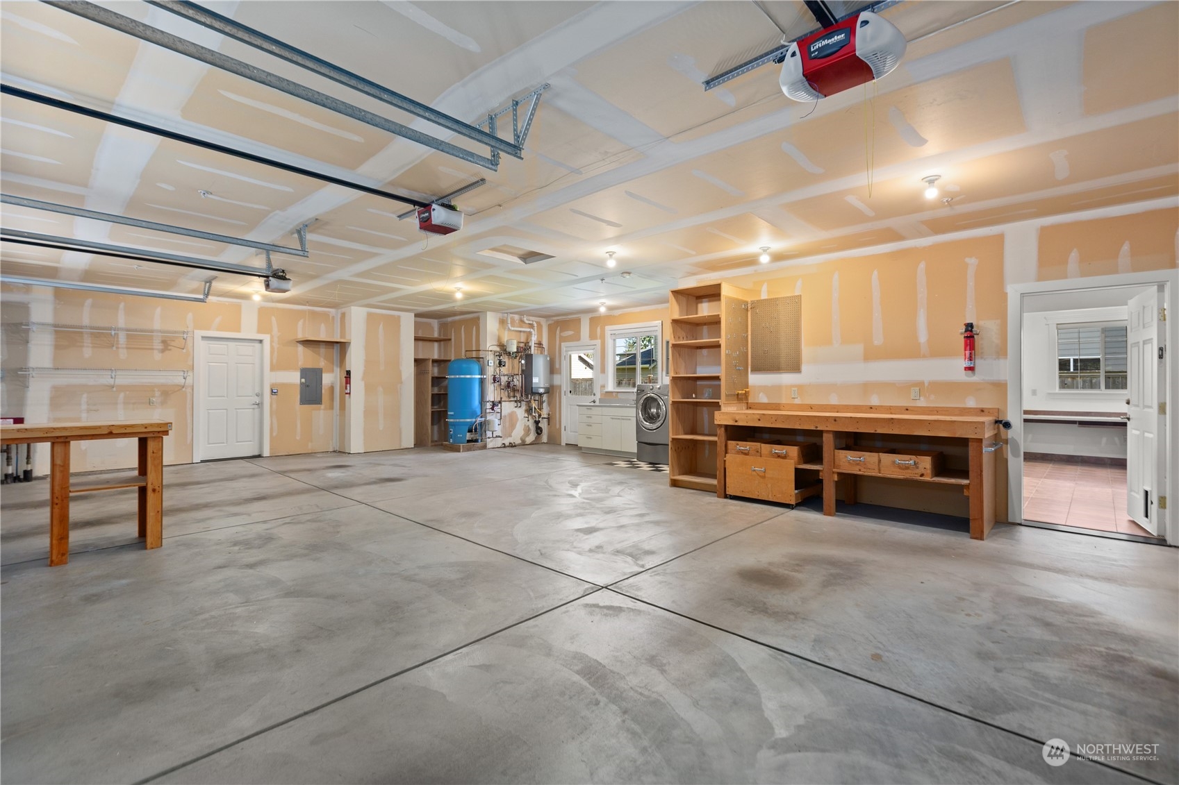 120 216th Street Southwest Bothell, WA 98021 - Photo 23 of 40 a view of a livingroom with furniture and a garage