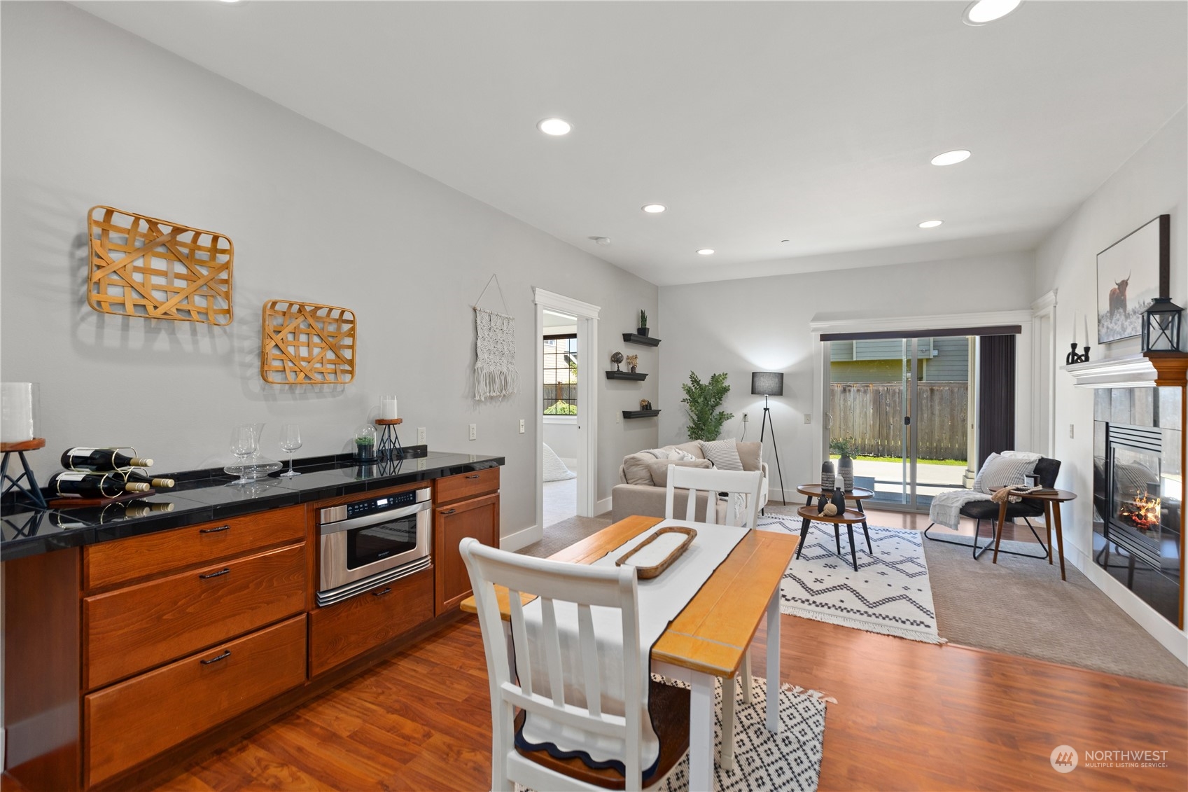120 216th Street Southwest Bothell, WA 98021 - Photo 26 of 40 a view of a dining room with furniture window and wooden floor