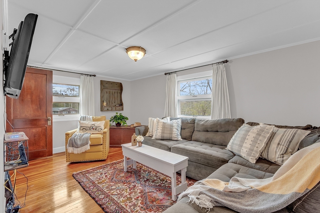 8 Mt Henry Road Shirley, MA 01464 - Photo 15 of 31 a living room with furniture and wooden floor