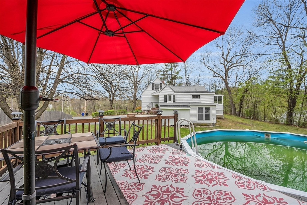 8 Mt Henry Road Shirley, MA 01464 - Photo 24 of 31 a view of a chair and table in the patio