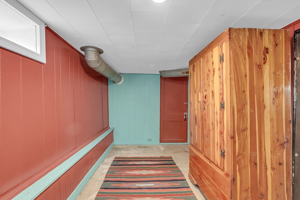 8 Mt Henry Road Shirley, MA 01464 - Photo 27 of 31 a view of a room with wooden floor and a stairs