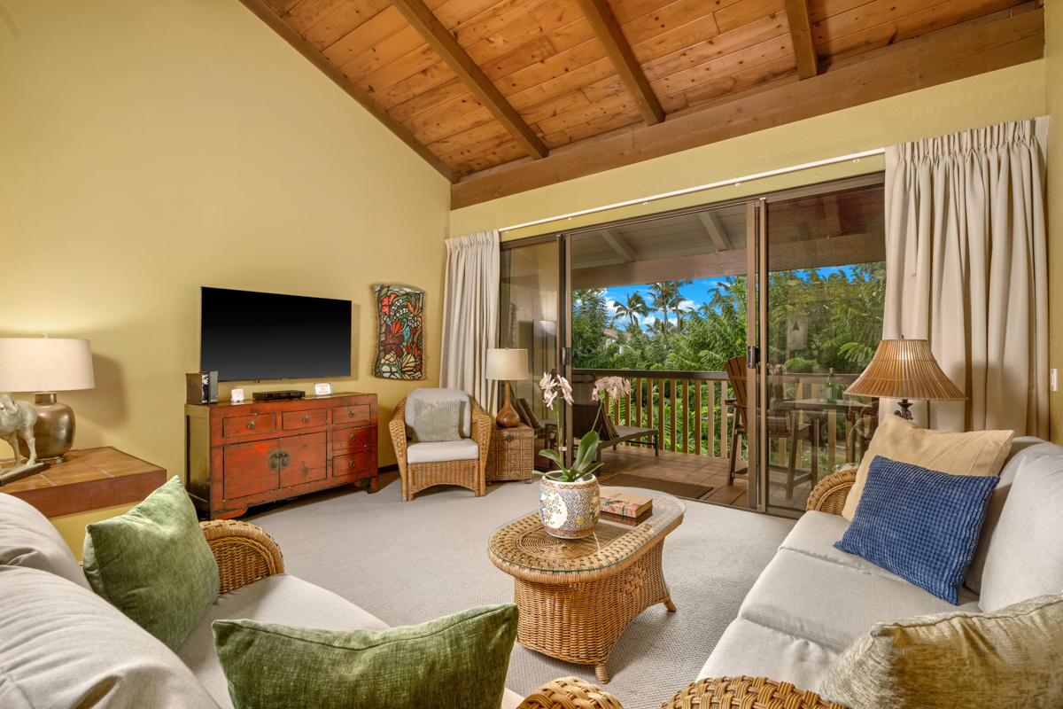 1870 Hoone Road, Unit 602 Koloa, HI 96756 - Photo 8 of 26 a living room with furniture and a flat screen tv