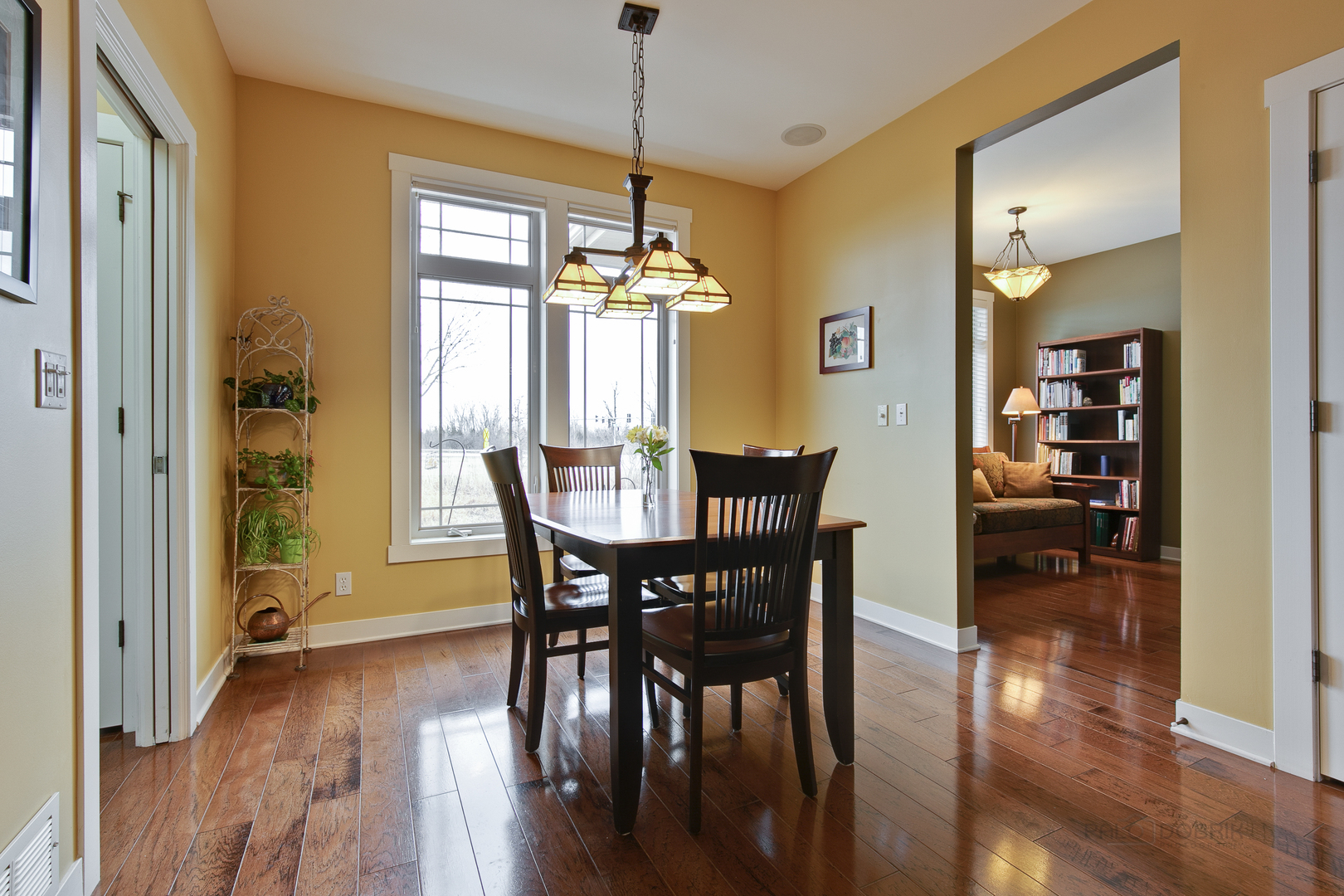 1024 Harris Road Grayslake, IL 60030 - Photo 13 of 29 a dining room with furniture window and wooden floor