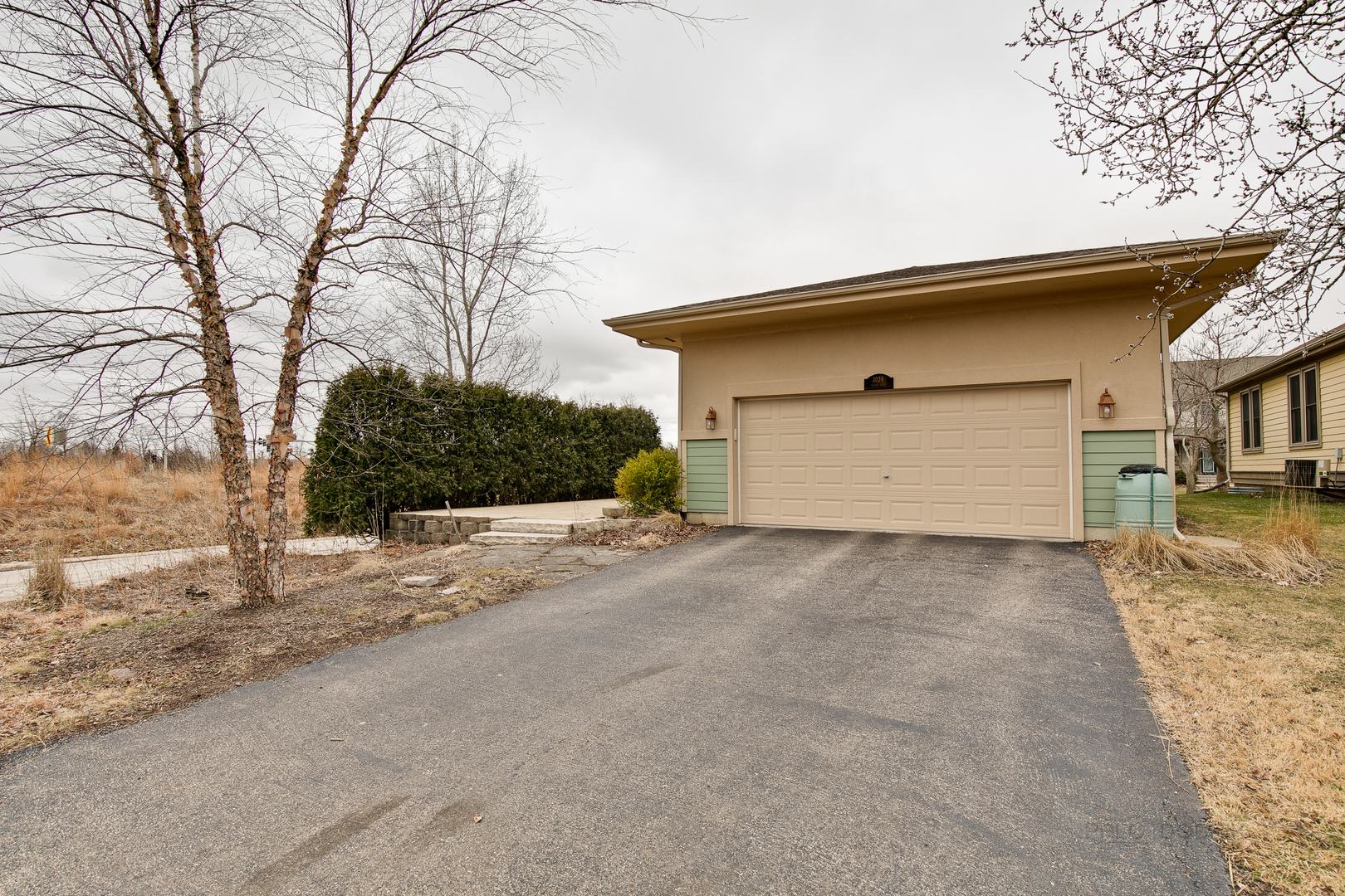 1024 Harris Road Grayslake, IL 60030 - Photo 29 of 29 a view of a house with a yard and garage