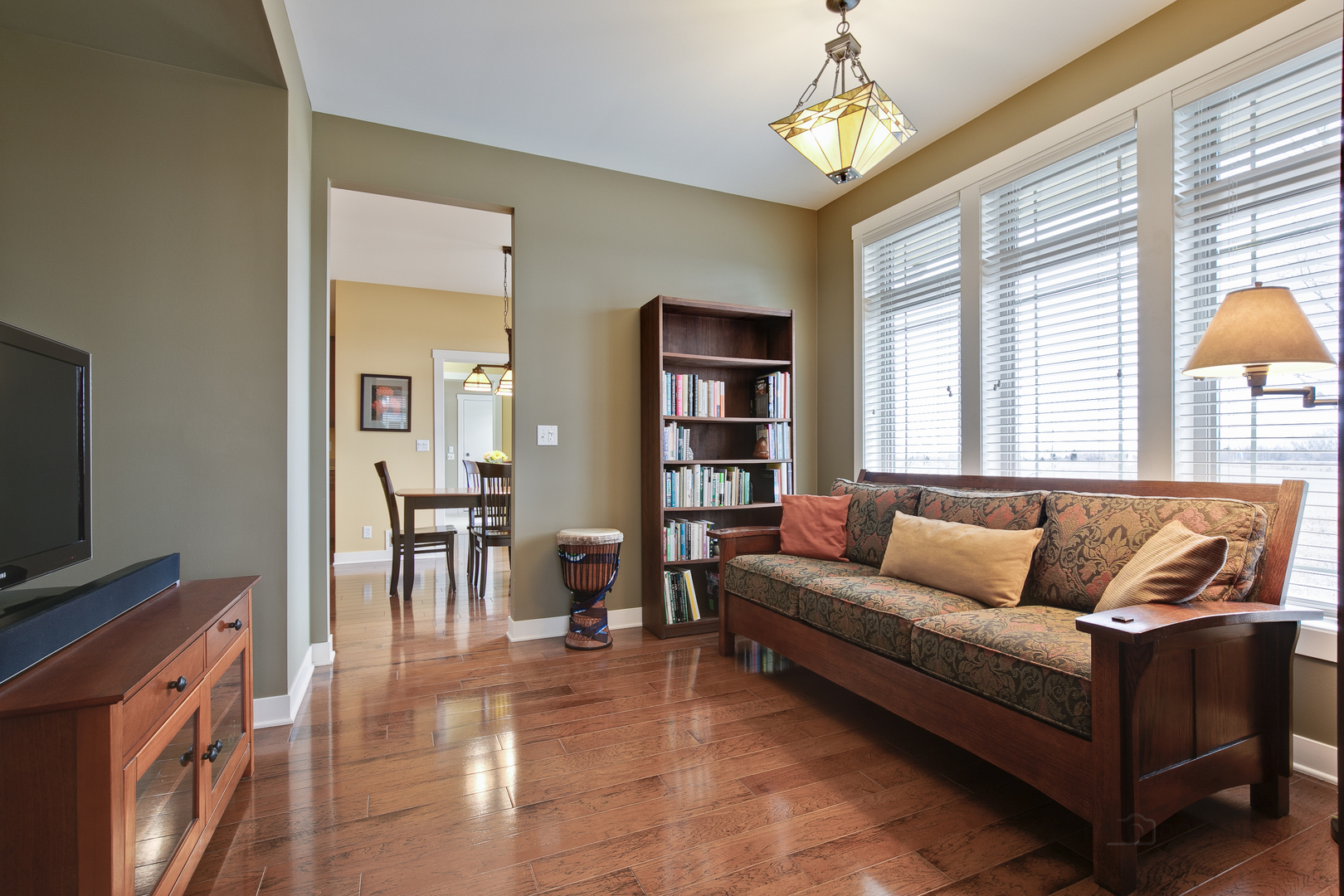 1024 Harris Road Grayslake, IL 60030 - Photo 7 of 29 a living room with furniture and a flat screen tv