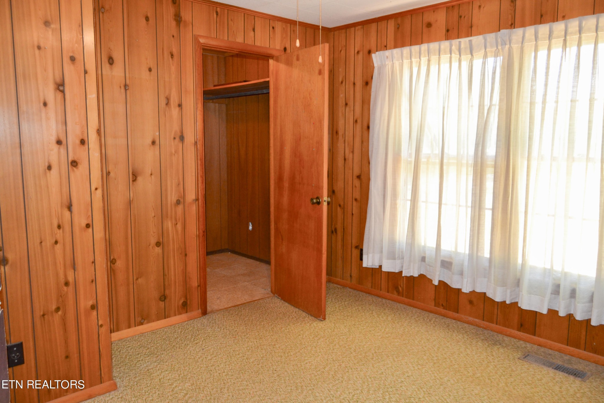 147 Tom Davis Road Livingston, TN 38570 - Photo 15 of 29 a view of an empty room with a window