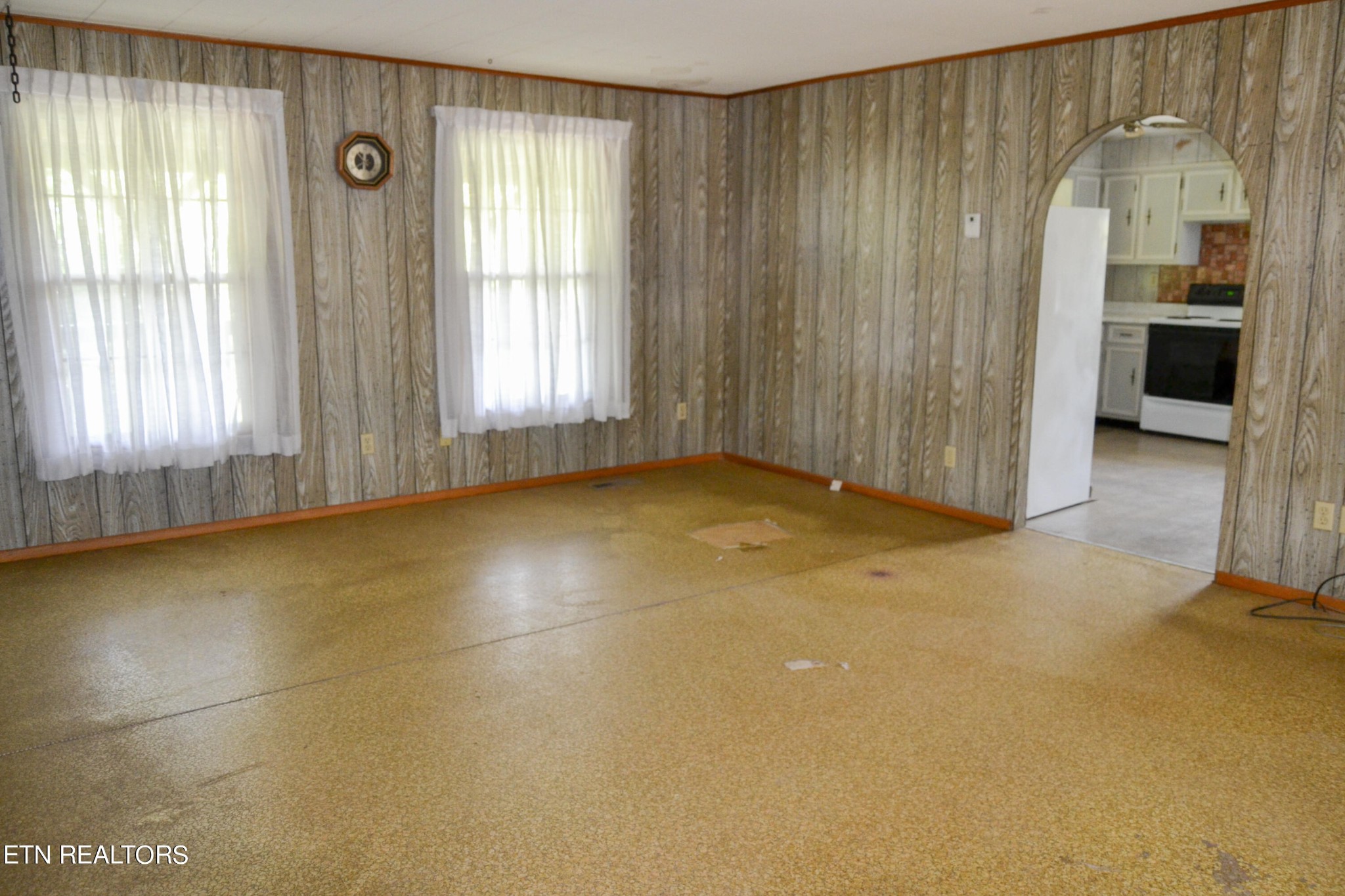 147 Tom Davis Road Livingston, TN 38570 - Photo 5 of 29 a view of an empty room with a fireplace and a window