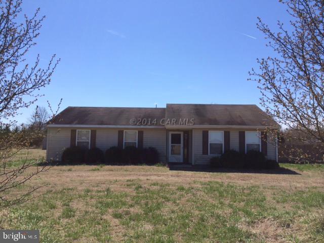 27063 Walnut Tree Road Eden, MD 21822 - Photo 1 of 22 a front view of a house with a yard
