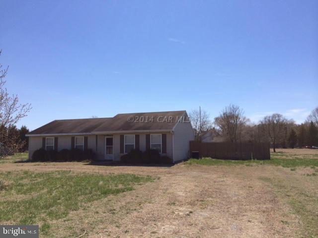 27063 Walnut Tree Road Eden, MD 21822 - Photo 2 of 22 a view of a house with a yard and wooden fence