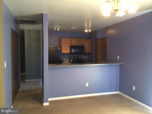 27063 Walnut Tree Road Eden, MD 21822 - Photo 6 of 22 a view of an empty room with kitchen