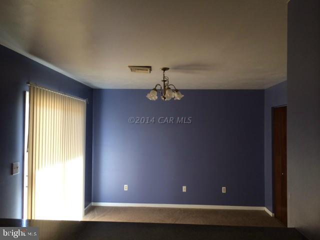 27063 Walnut Tree Road Eden, MD 21822 - Photo 8 of 22 a view of room with window and a ceiling fan