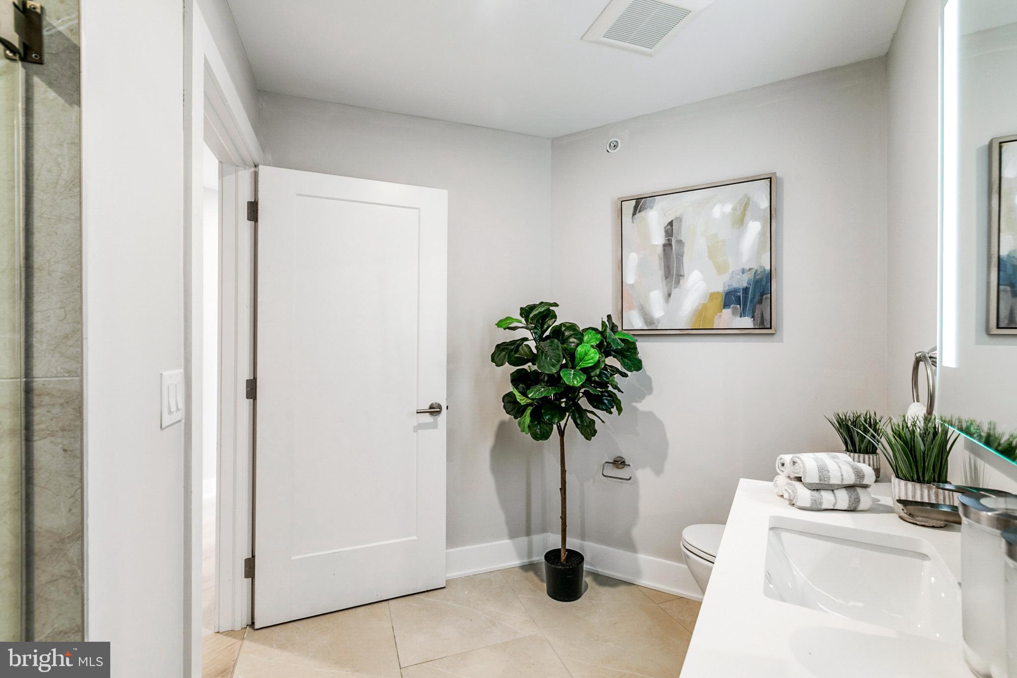 1533 Ridge Avenue, Unit 506 Philadelphia, PA 19130 - Photo 6 of 20 a vase of flowers sitting on a table