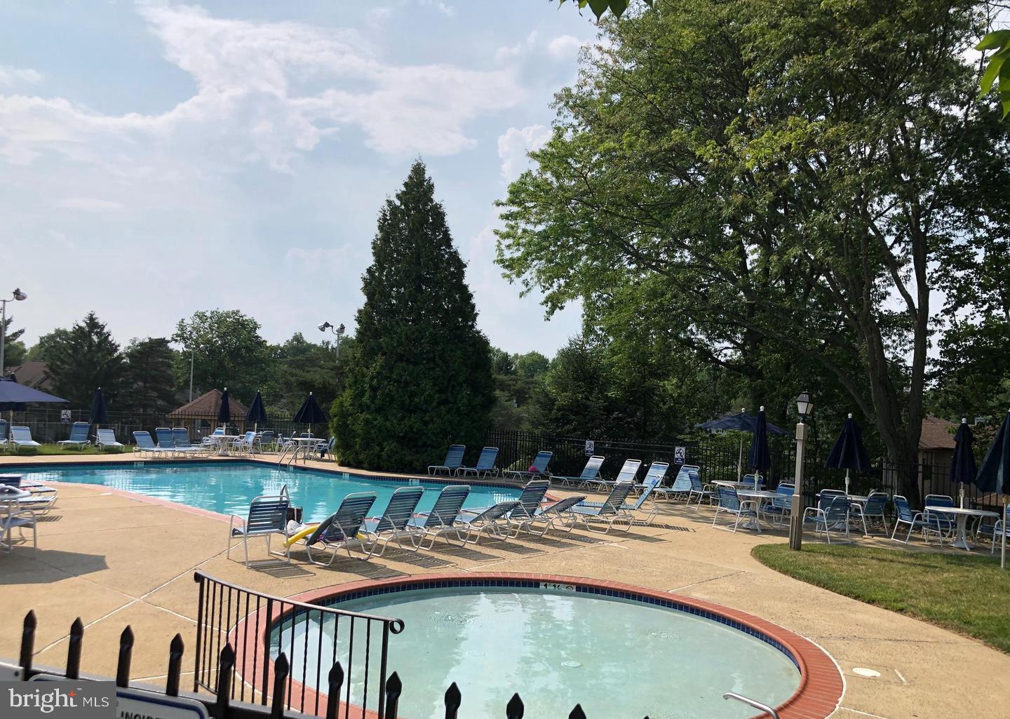 202 Hackberry Court Warrington, PA 18976 - Photo 5 of 7 a view of swimming pool with outdoor seating and yard