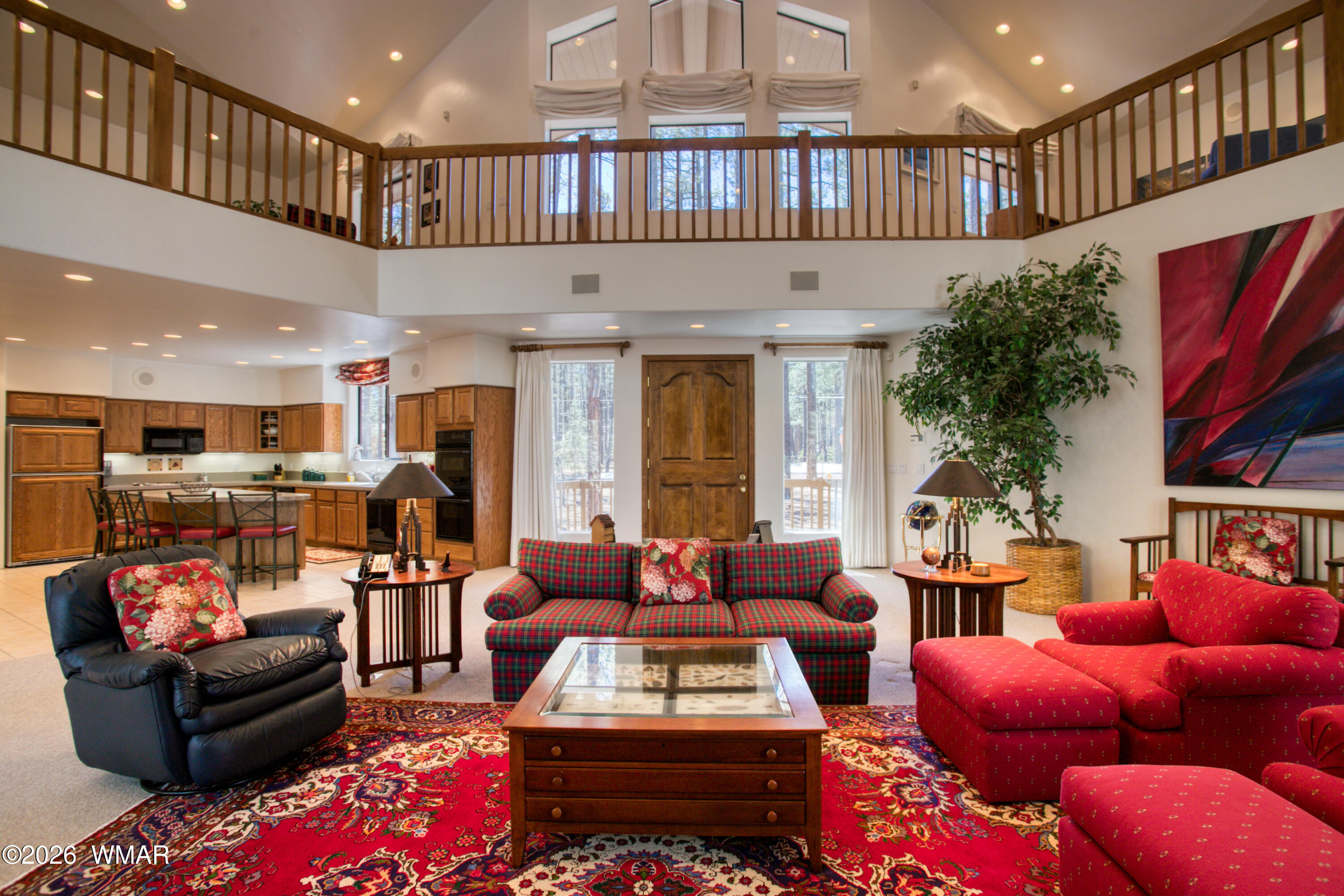2896 Aspen Road Pinetop, AZ 85935 - Photo 12 of 75 a living room with furniture ceiling fan and a rug
