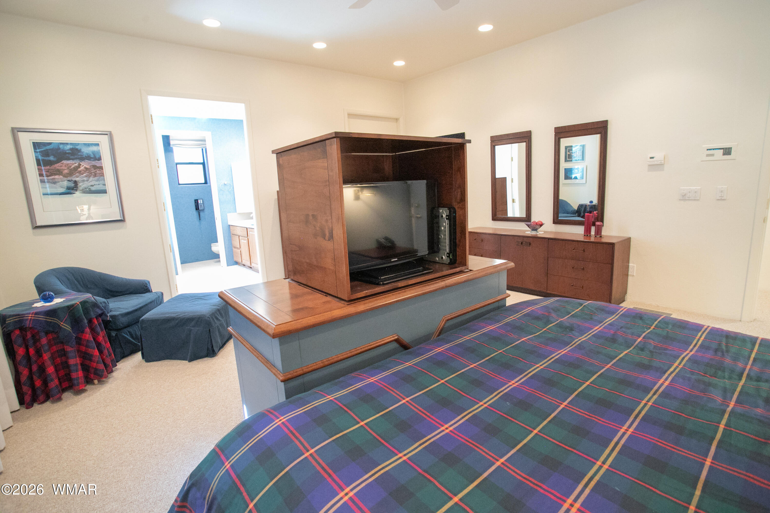 2896 Aspen Road Pinetop, AZ 85935 - Photo 21 of 75 a living room with a bed and a flat screen tv