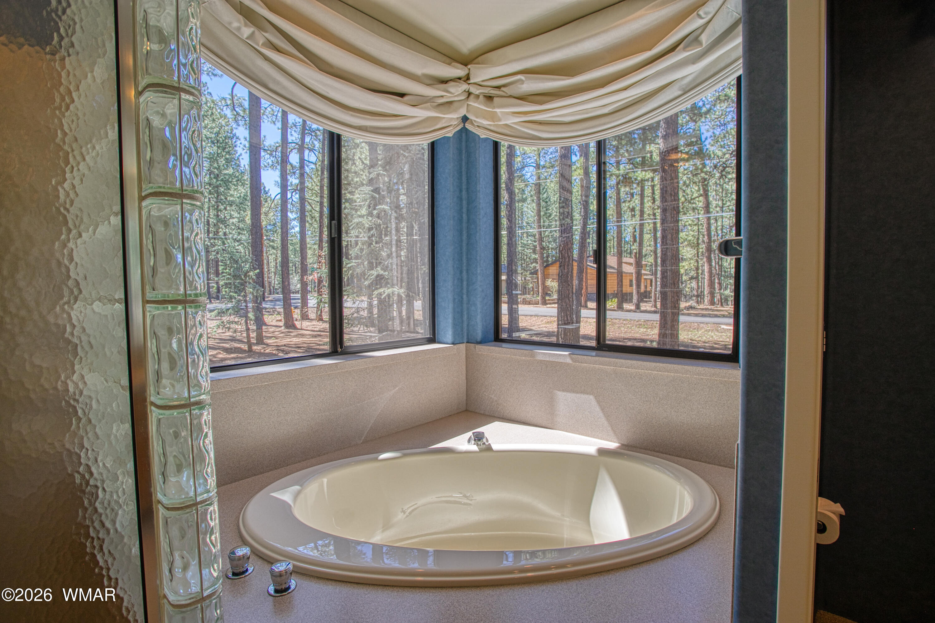 2896 Aspen Road Pinetop, AZ 85935 - Photo 24 of 75 a bathroom with a tub and shower