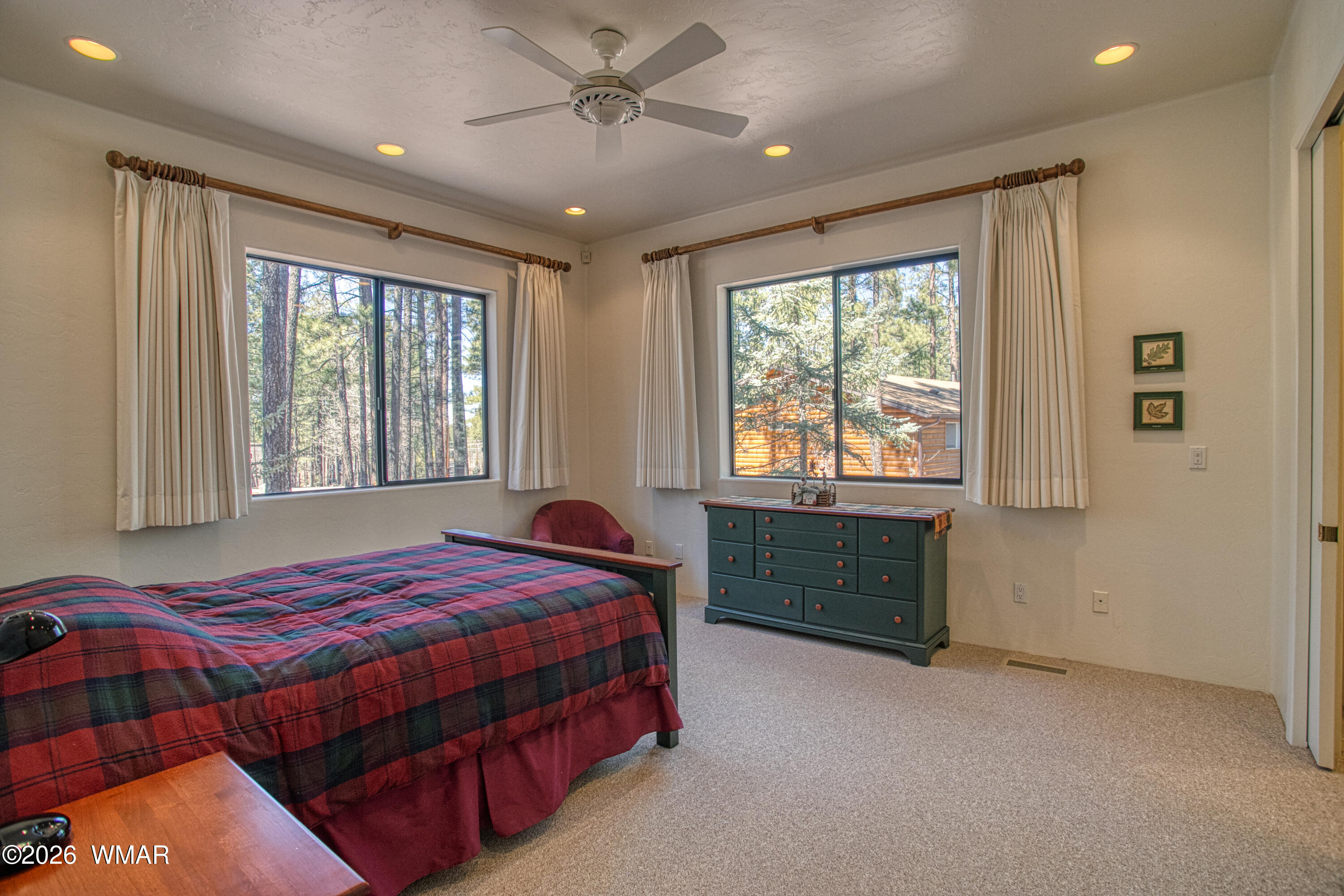 2896 Aspen Road Pinetop, AZ 85935 - Photo 44 of 75 a bedroom with a bed and a window