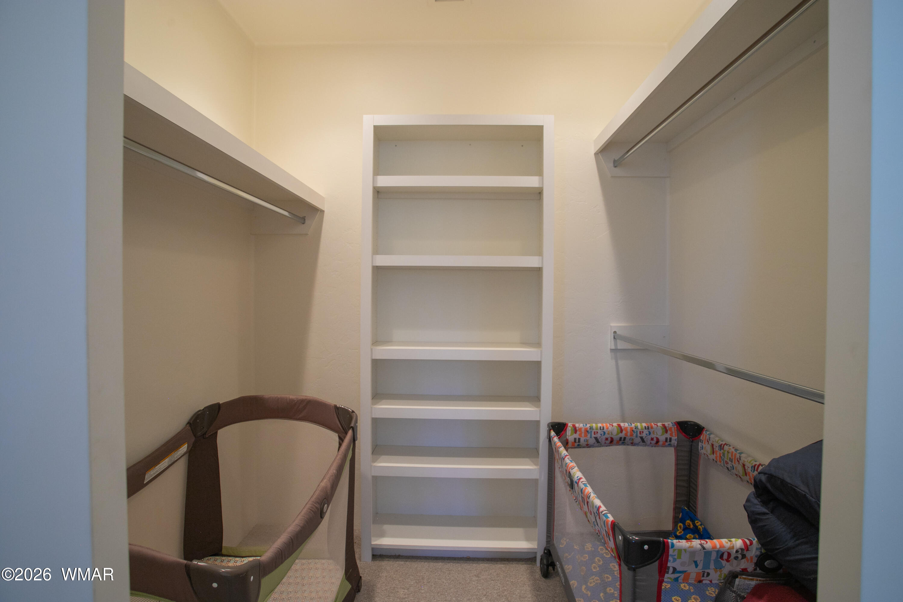 2896 Aspen Road Pinetop, AZ 85935 - Photo 45 of 75 a view of walk in closet with empty racks