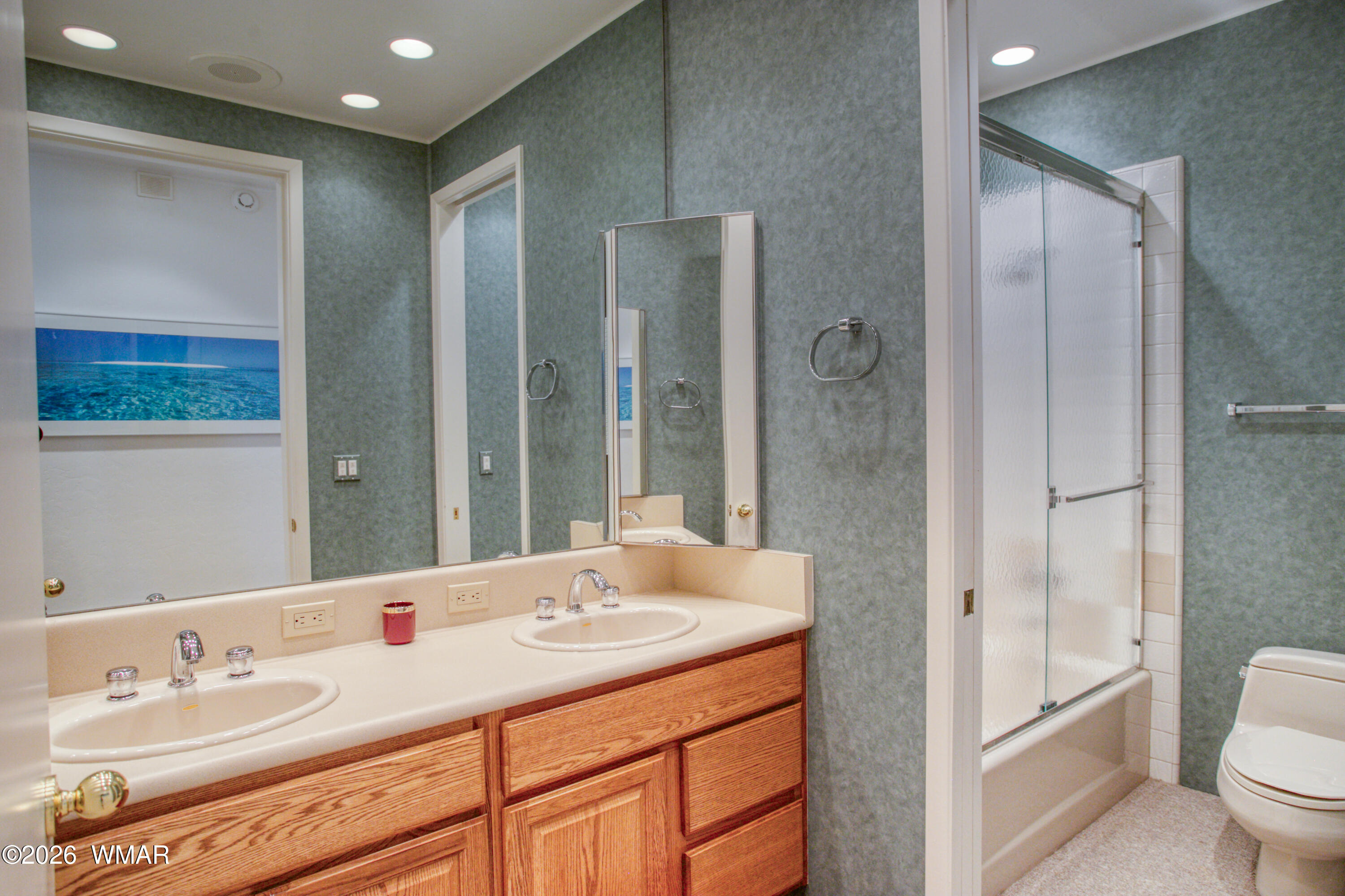 2896 Aspen Road Pinetop, AZ 85935 - Photo 46 of 75 a bathroom with a sink a toilet and shower