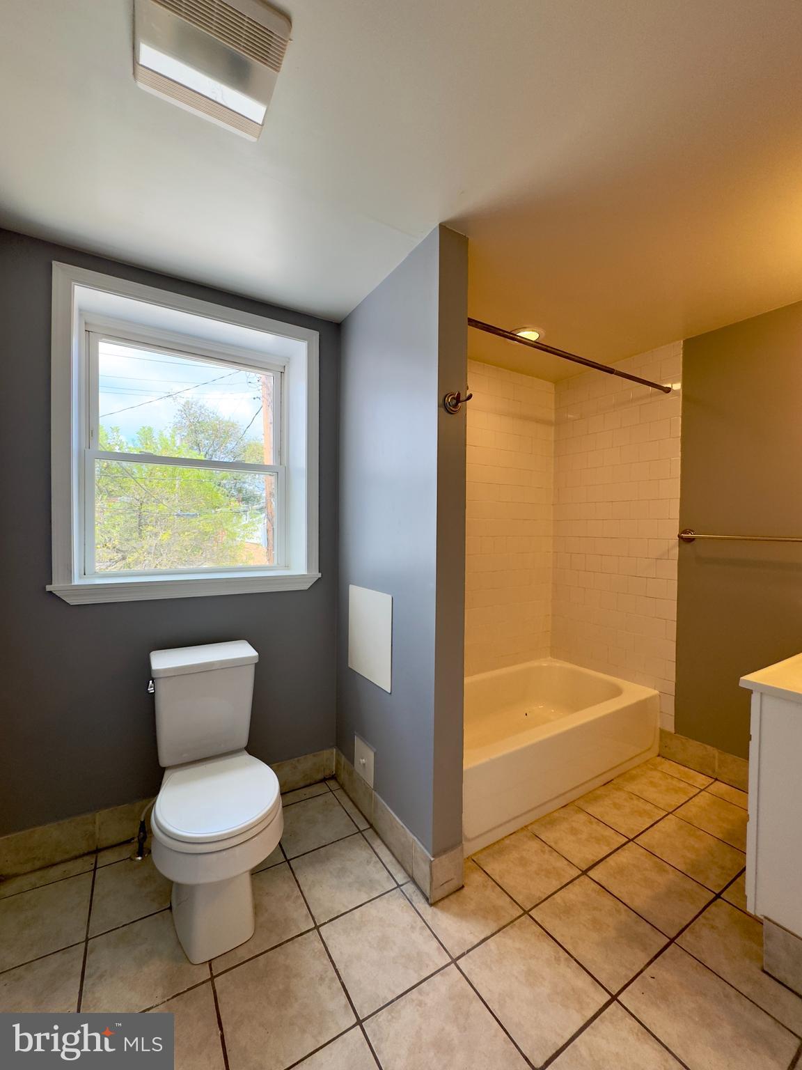 3314 Keswick Road Baltimore, MD 21211 - Photo 15 of 20 a bathroom with a toilet a sink and a shower