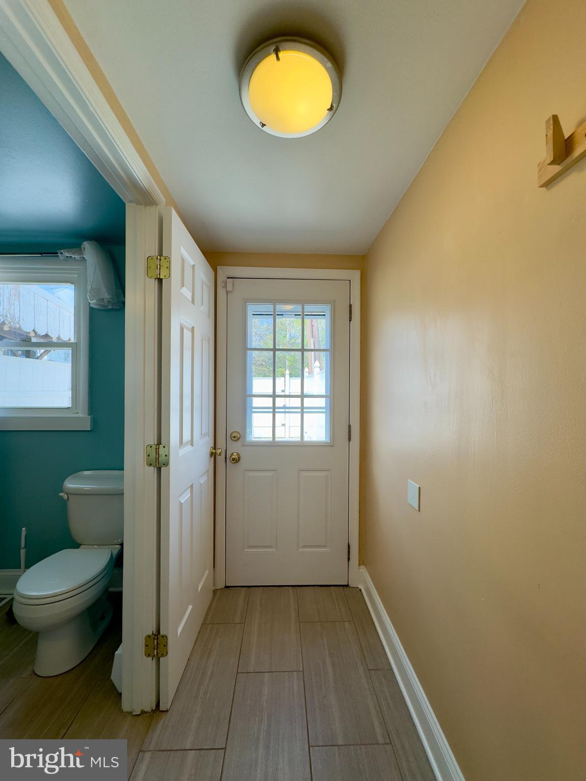 3314 Keswick Road Baltimore, MD 21211 - Photo 10 of 20 a bathroom with a toilet sink and shower