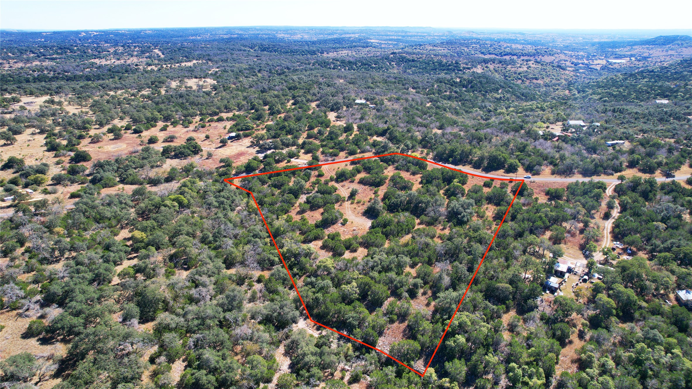 610 Deer Road Fredericksburg, TX 78624 - Photo 3 of 8 Aerial overview of property's location with property parcel outlined