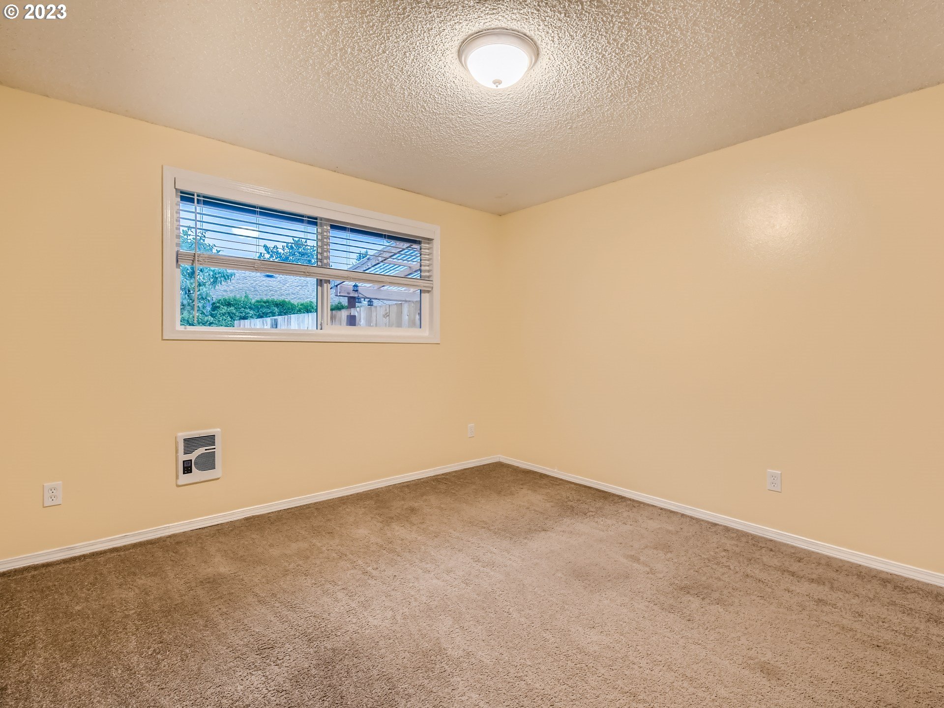 885 Southeast Lambert Circle Gresham, OR 97080 - Photo 36 of 45 an empty room with windows