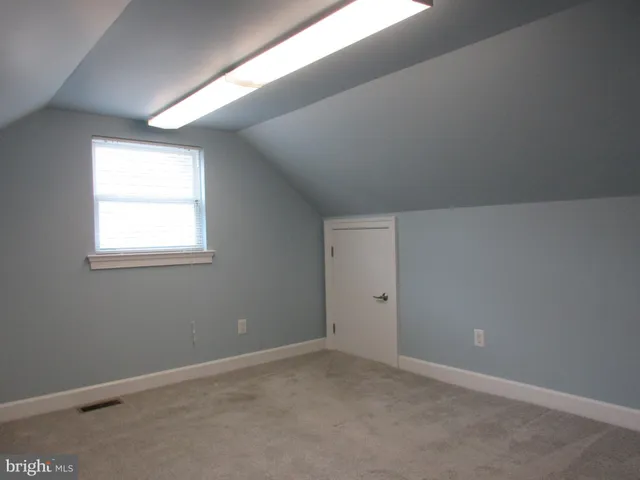 a bathroom with a bath tub and a shower